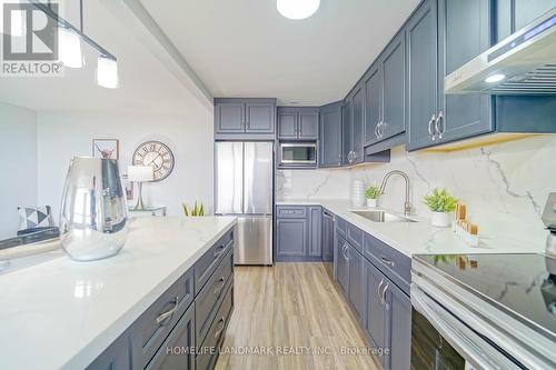 1209 - 1950 Kennedy Road, Toronto (Dorset Park), ON - Indoor Photo Showing Kitchen With Upgraded Kitchen