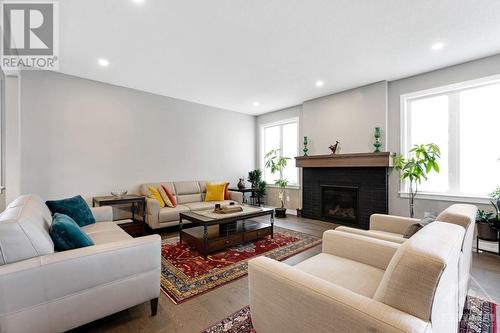 255 Condado Crescent, Ottawa, ON - Indoor Photo Showing Living Room With Fireplace