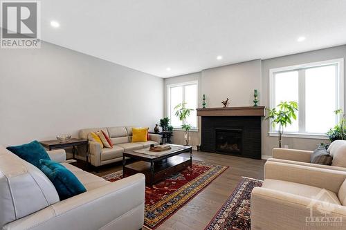 255 Condado Crescent, Ottawa, ON - Indoor Photo Showing Living Room With Fireplace