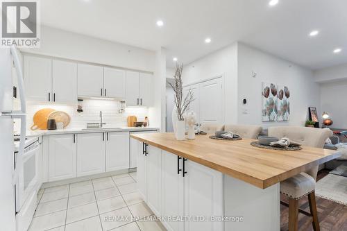 304 - 157 Wellington Street E, New Tecumseth (Alliston), ON - Indoor Photo Showing Kitchen With Upgraded Kitchen