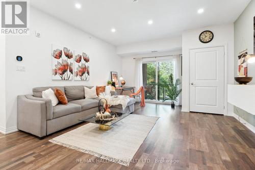 304 - 157 Wellington Street E, New Tecumseth (Alliston), ON - Indoor Photo Showing Living Room