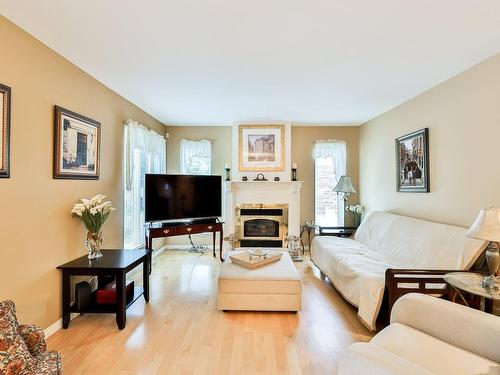 Family room - 12 Ch. De Rambervillers, Lorraine, QC - Indoor Photo Showing Living Room With Fireplace