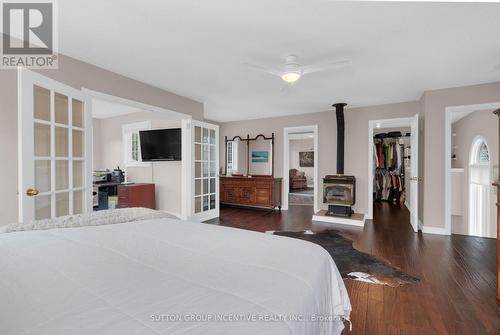 54 Highland Drive, Oro-Medonte (Horseshoe Valley), ON - Indoor Photo Showing Bedroom With Fireplace