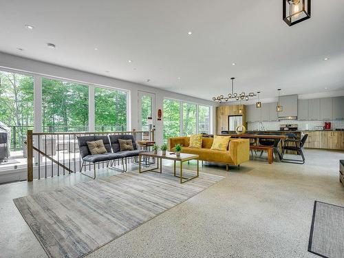 Vue d'ensemble - 10 Rue Du Denali, La Conception, QC - Indoor Photo Showing Living Room