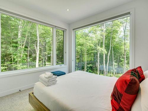 Master bedroom - 10 Rue Du Denali, La Conception, QC - Indoor Photo Showing Bedroom