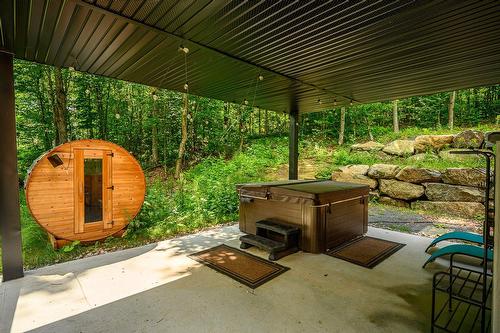 Spa - 10 Rue Du Denali, La Conception, QC - Outdoor With Deck Patio Veranda