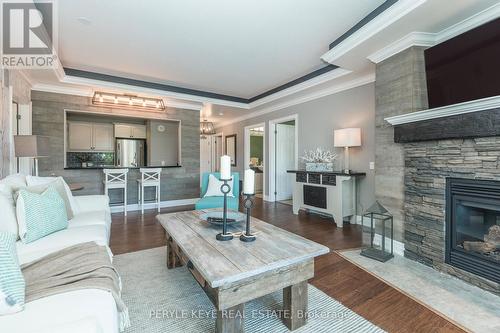 204 - 130 Steamship Bay Road, Gravenhurst, ON - Indoor Photo Showing Living Room With Fireplace