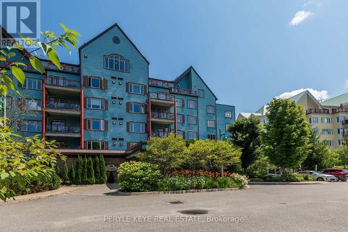 204 - 130 Steamship Bay Road, Gravenhurst, ON - Outdoor With Balcony With Facade