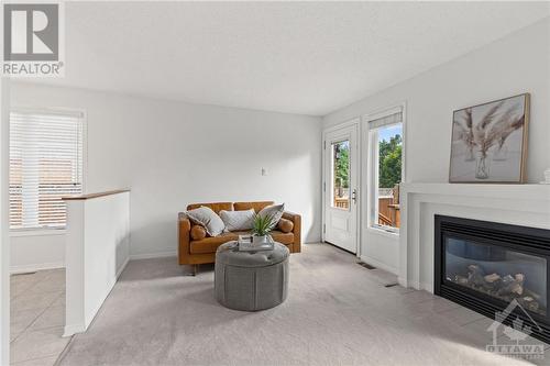 78 Beechfern Drive, Ottawa, ON - Indoor Photo Showing Living Room With Fireplace