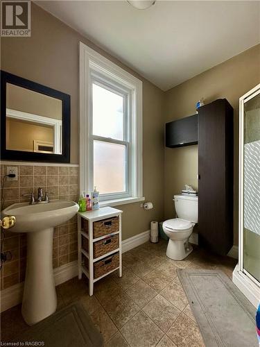 **taken with wide lens to show the entire space** - 403 7Th Avenue, Hanover, ON - Indoor Photo Showing Bathroom