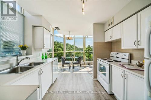 605 - 20 Southport Street, Toronto (High Park-Swansea), ON - Indoor Photo Showing Kitchen With Double Sink