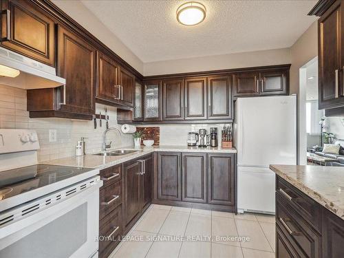 1001-2301 Derry Rd W, Mississauga, ON - Indoor Photo Showing Kitchen With Double Sink