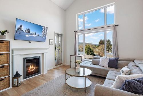 407-2823 Jacklin Rd, Langford, BC - Indoor Photo Showing Living Room With Fireplace