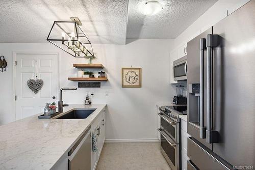 407-2823 Jacklin Rd, Langford, BC - Indoor Photo Showing Kitchen With Upgraded Kitchen