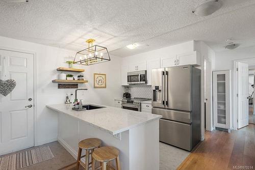 407-2823 Jacklin Rd, Langford, BC - Indoor Photo Showing Kitchen With Upgraded Kitchen