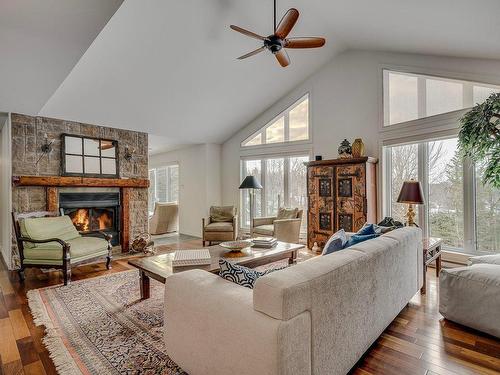 Salon - 15 Av. D'Amiens, Estérel, QC - Indoor Photo Showing Living Room With Fireplace