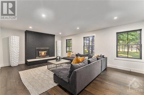 Main floor family room - 1835 Stittsville Main Street, Ottawa, ON - Indoor Photo Showing Living Room With Fireplace