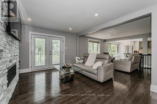 5954 Wellington Road 7, Centre Wellington, ON - Indoor Photo Showing Living Room With Fireplace