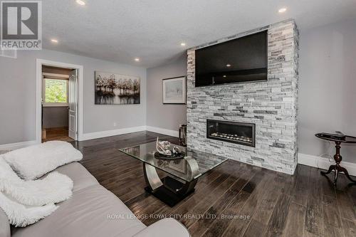 5954 Wellington Road 7, Centre Wellington, ON - Indoor Photo Showing Living Room With Fireplace