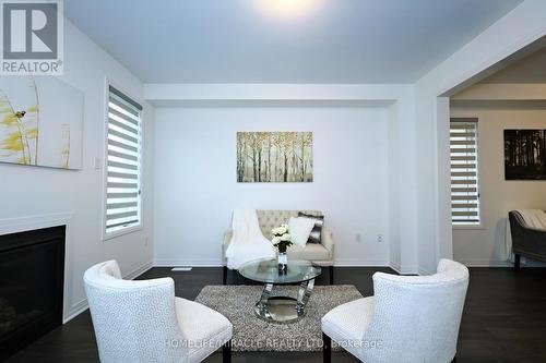 8 Copperhill Heights, Barrie (Painswick South), ON - Indoor Photo Showing Living Room With Fireplace