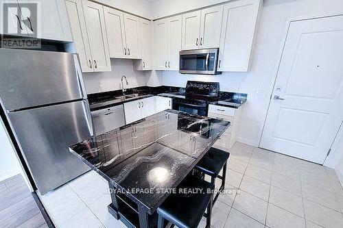 714 - 2490 Old Bronte Road, Oakville (Palermo West), ON - Indoor Photo Showing Kitchen