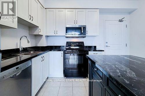 714 - 2490 Old Bronte Road, Oakville (Palermo West), ON - Indoor Photo Showing Kitchen With Double Sink