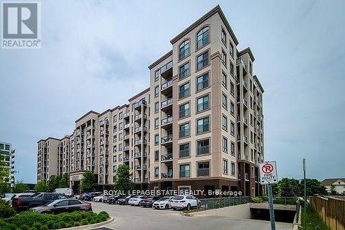 714 - 2490 Old Bronte Road, Oakville (Palermo West), ON - Outdoor With Facade