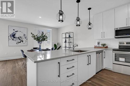 103 - 175 Doan Drive W, Middlesex Centre (Kilworth), ON - Indoor Photo Showing Kitchen With Upgraded Kitchen