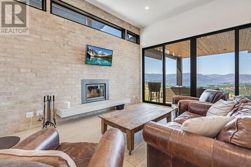 1220 Ponds Avenue, Kelowna, BC - Indoor Photo Showing Living Room With Fireplace