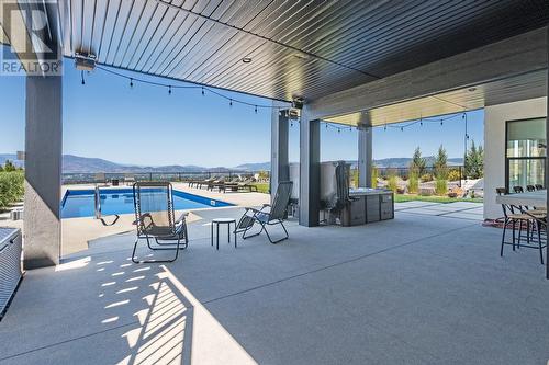 1220 Ponds Avenue, Kelowna, BC - Outdoor With In Ground Pool With Deck Patio Veranda With Exterior