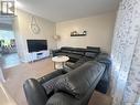 102 350 Maccormack Road, Martensville, SK  - Indoor Photo Showing Living Room 