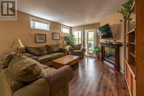 1780 Atkinson Avenue Unit# 106, Penticton, BC - Indoor Photo Showing Living Room With Fireplace