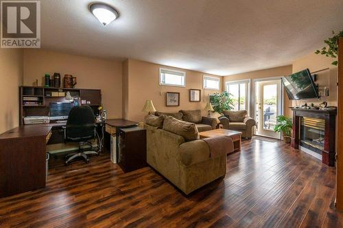 1780 Atkinson Avenue Unit# 106, Penticton, BC - Indoor Photo Showing Living Room With Fireplace