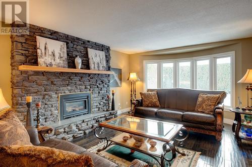 1638 Pritchard Drive, West Kelowna, BC - Indoor Photo Showing Living Room With Fireplace