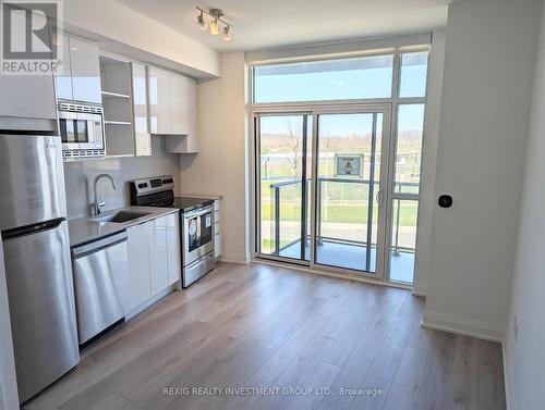 218 - 60 George Butchart Drive N, Toronto (Downsview-Roding-Cfb), ON - Indoor Photo Showing Kitchen