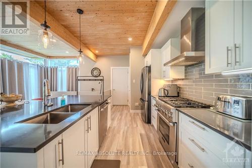 887 Route 400 Route, Russell, ON - Indoor Photo Showing Kitchen With Stainless Steel Kitchen With Double Sink With Upgraded Kitchen