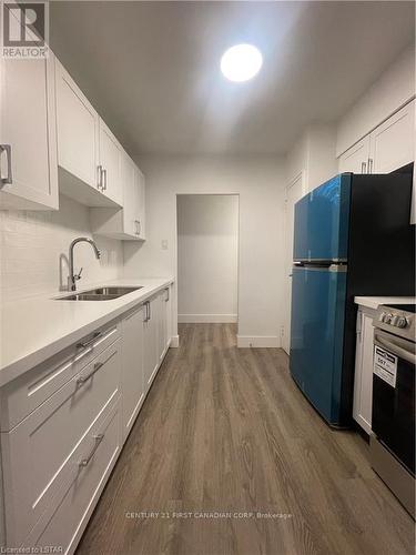 307 - 225 Cathcart Street, London, ON - Indoor Photo Showing Kitchen With Double Sink