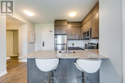 216 - 95 Dundas Street W, Oakville, ON - Indoor Photo Showing Kitchen With Double Sink With Upgraded Kitchen