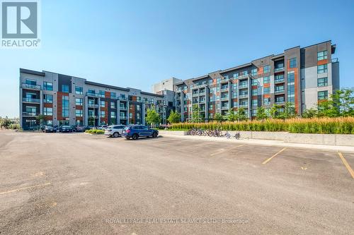 216 - 95 Dundas Street W, Oakville, ON - Outdoor With Balcony With Facade