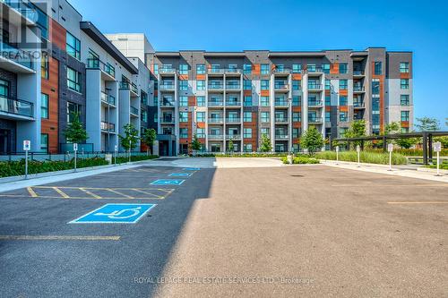 216 - 95 Dundas Street W, Oakville, ON - Outdoor With Balcony With Facade