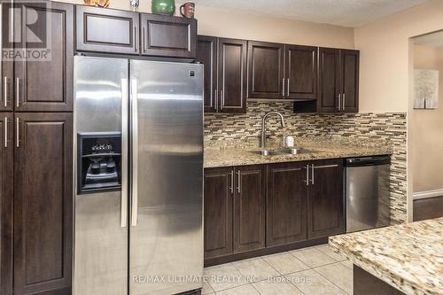 116 - 75 Emmett Avenue, Toronto (Mount Dennis), ON - Indoor Photo Showing Kitchen With Stainless Steel Kitchen With Double Sink