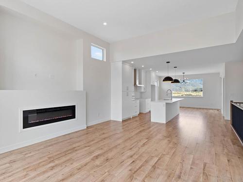 265 Rue Cheval Noir, Kamloops, BC - Indoor Photo Showing Living Room With Fireplace