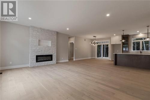 168 Joviale Drive, Irishtown, NB - Indoor Photo Showing Living Room With Fireplace