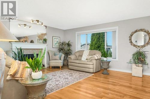 958 Mt Beaven Place, Vernon, BC - Indoor Photo Showing Living Room With Fireplace