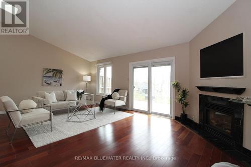 24 - 90 Ontario Street S, Lambton Shores (Grand Bend), ON - Indoor Photo Showing Living Room With Fireplace