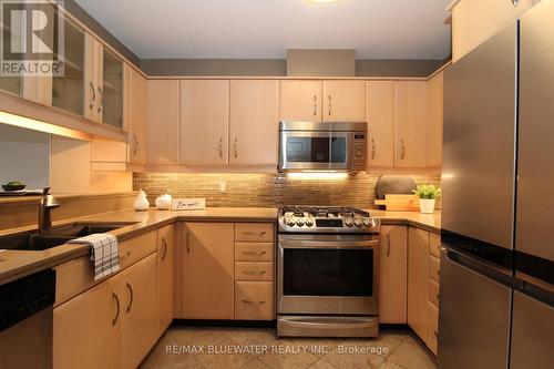 24 - 90 Ontario Street S, Lambton Shores (Grand Bend), ON - Indoor Photo Showing Kitchen With Upgraded Kitchen