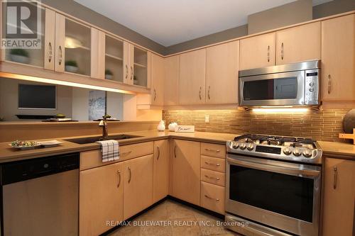 24 - 90 Ontario Street S, Lambton Shores (Grand Bend), ON - Indoor Photo Showing Kitchen With Double Sink