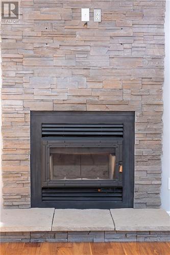 Living room fireplace - 11 Behnke Crescent, Pembroke, ON - Indoor Photo Showing Living Room With Fireplace