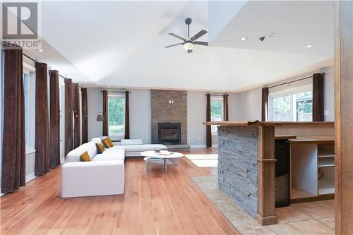 AI image - 11 Behnke Crescent, Pembroke, ON - Indoor Photo Showing Living Room With Fireplace