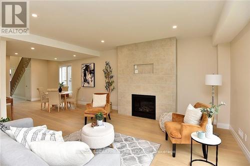 20 Clare Avenue, Hamilton (Hamilton Beach), ON - Indoor Photo Showing Living Room With Fireplace